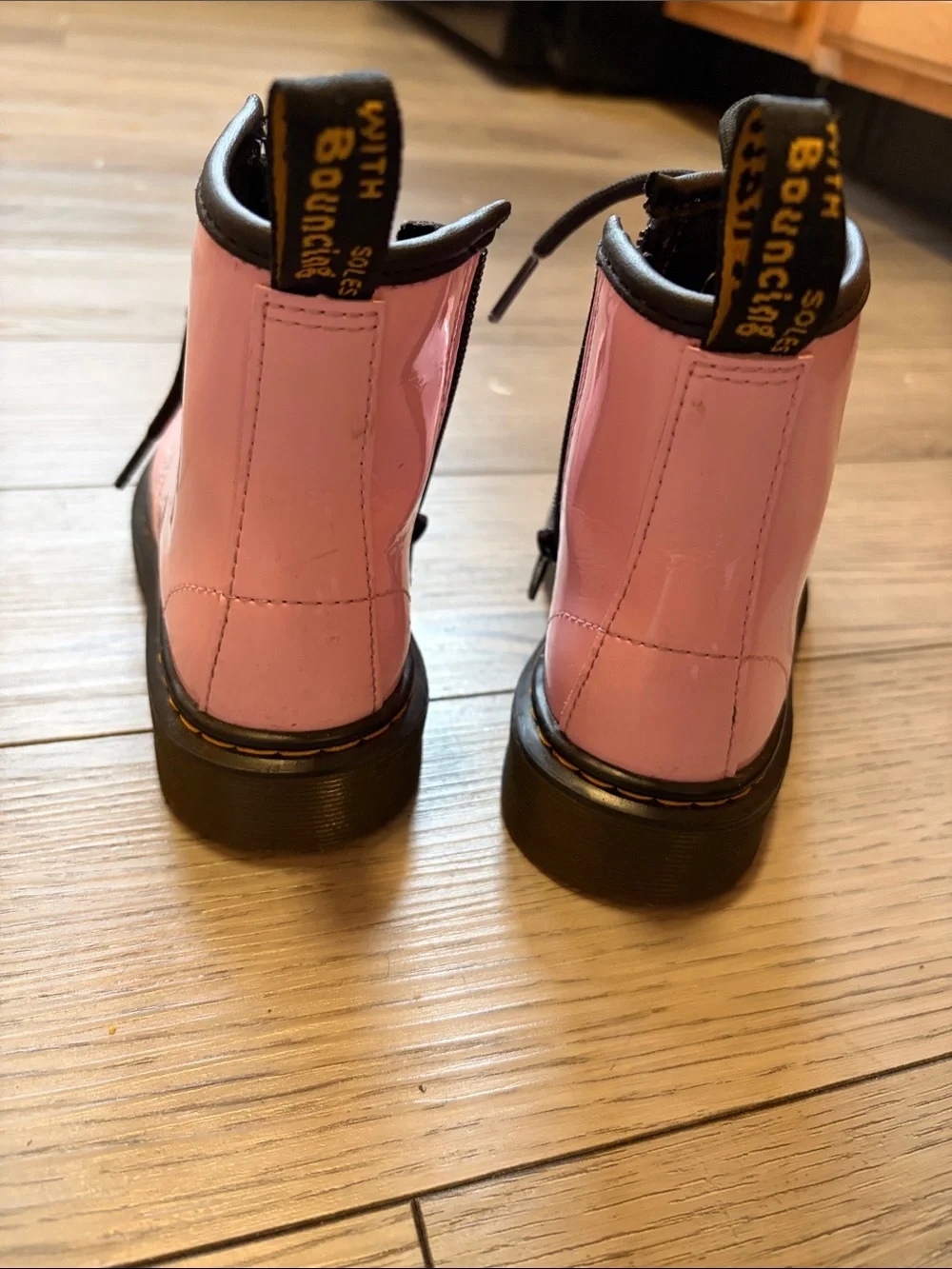 Dr. Martens Pink Lace-Up Combat Boots with Black Soles
